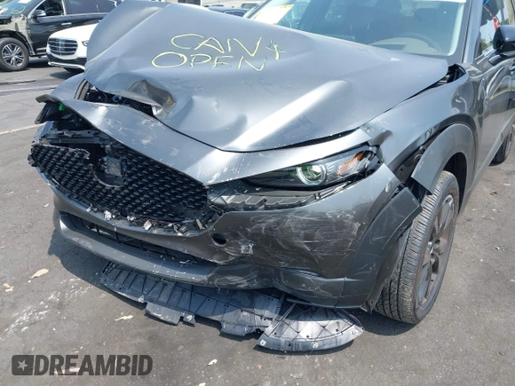 2024 Mazda CX-30 Premium Plus with VIN 3MVDMBEY1RM720111, listed as a IAAI auction lot 42730412 with 3,988 mi miles and . Bid and sale history available at DreamBid. Image 6.