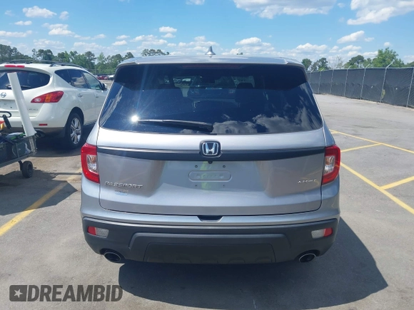 2021 Honda Passport Sport with VIN 5FNYF7H27MB003467, listed as a IAAI auction lot 42183219 with 52,156 mi miles and . Bid and sale history available at DreamBid. Image 16.