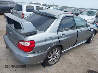 2007 Subaru Impreza WRX STI z VIN JF1GD76677L526227, wystawiony jako IAAI lot #42034710 z przebiegiem 93 767 mil mil oraz . Historia ofert i sprzedaży dostępna na DreamBid. Obrazek 4.