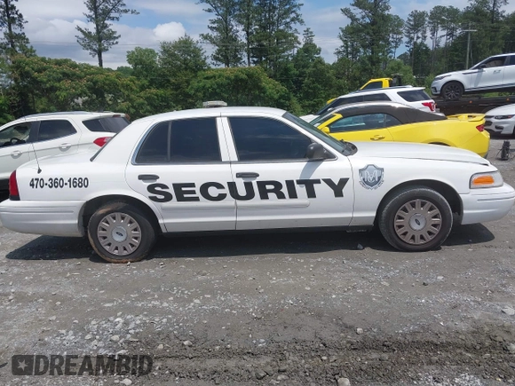 2005 Ford Police Interceptor with VIN 2FAHP71W95X137155, listed as a IAAI auction lot 42375960 with 117,866 mi miles and . Bid and sale history available at DreamBid. Image 12.