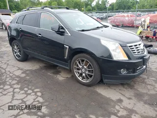 2013 Cadillac SRX Performance Collection z VIN 3GYFNHE39DS642111, wystawiony jako IAAI lot #42470291 z przebiegiem 176 239 mil mil oraz . Historia ofert i sprzedaży dostępna na DreamBid. Obrazek 1.