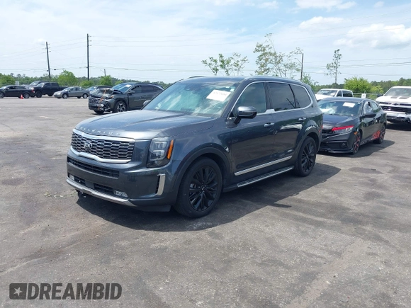 2021 Kia Telluride SX with VIN 5XYP54HC7MG130377, listed as a IAAI auction lot 42172684 with 32,186 mi miles and . Bid and sale history available at DreamBid. Image 2.