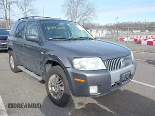 2006 Mercury Mariner Luxury with VIN 4M2YU57136DJ05176, listed as a IAAI auction lot 41499648 with 152,185 mi miles and . Bid and sale history available at DreamBid. Image 1.