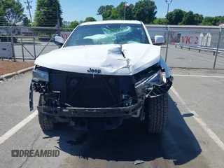 2020 Jeep Grand Cherokee Laredo E z VIN 1C4RJFAGXLC199564, wystawiony jako IAAI lot #42142905 z przebiegiem 83 024 mil mil oraz . Historia ofert i sprzedaży dostępna na DreamBid. Obrazek 12.