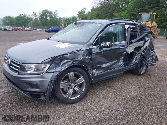 2021 Volkswagen Tiguan SE z VIN 3VV2B7AXXMM070228, wystawiony jako IAAI lot #42295644 z przebiegiem 89 576 mil mil oraz . Historia ofert i sprzedaży dostępna na DreamBid. Obrazek 2.