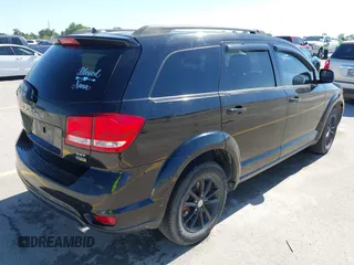 2015 Dodge Journey SXT with VIN 3C4PDCBG0FT595359, listed as a IAAI auction lot 41987773 with 135,528 mi miles. Bid and sale history available at carsss.com. Image 4.