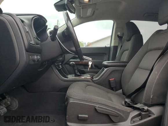 2019 GMC Canyon 4WD SLE z VIN 1GTG6CEN1K1206640, wystawiony jako Copart lot #55339285 z przebiegiem 52 166 mil mil oraz Szkody całkowita. Historia ofert i sprzedaży dostępna na DreamBid. Obrazek 7.