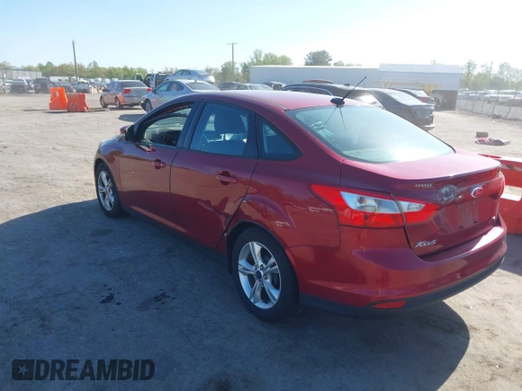2014 Ford Focus SE with VIN 1FADP3F27EL202224, listed as a IAAI auction lot 42067644 with 174,674 mi miles. Bid and sale history available at carsss.com. Image 3.
