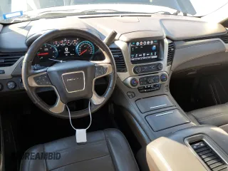 2018 GMC Yukon Denali with VIN 1GKS2CKJ6JR149752, listed as a Copart auction lot 82624404 with 137,640 mi miles and Salvage Title. Bid and sale history available at carsss.com. Image 8.