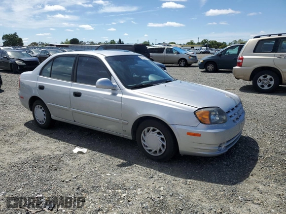 2005 Hyundai Accent GLS with VIN KMHCG45C65U576674, listed as a Copart auction lot 50726074 with 118,532 mi miles and Non Repairable. Bid and sale history available at carsss.com. Image 4.