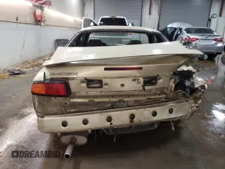 1995 Nissan 240SX z VIN JN1AS44D1SW002698, wystawiony jako Copart lot #84172564 z przebiegiem 112 922 mil mil oraz Szkody całkowita. Historia ofert i sprzedaży dostępna na DreamBid. Obrazek 6.