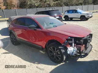 2021 Mazda CX-30 Premium with VIN 3MVDMBDY0MM312354, listed as a Copart auction lot 77112334 with 47,351 mi miles and Salvage Title. Bid and sale history available at carsss.com. Image 4.
