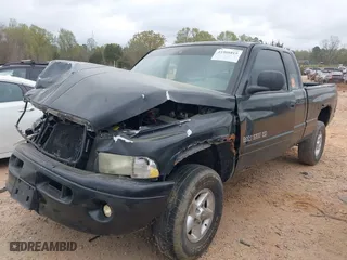 2000 Dodge Ram 1500 with VIN 1B7HF13Z1YJ154983, listed as a IAAI auction lot 41908819 with 229,912 mi miles. Bid and sale history available at carsss.com. Image 2.