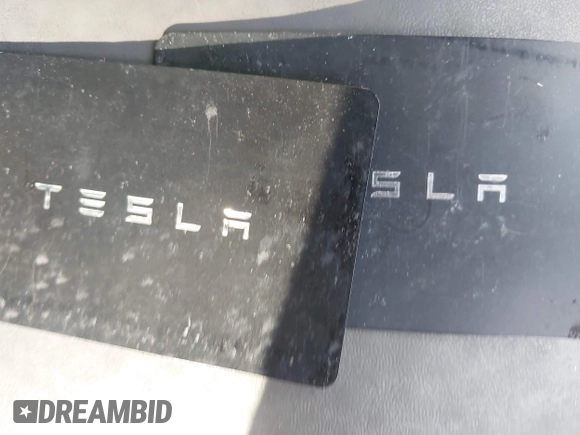 2021 Tesla Model 3 Long Range with VIN 5YJ3E1EB1MF056759, listed as a IAAI auction lot 41464108 with 48,694 mi miles and . Bid and sale history available at carsss.com. Image 11.