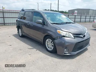 2015 Toyota Sienna XLE with VIN 5TDYK3DCXFS688971, listed as a IAAI auction lot 42127912 with 143,024 mi miles. Bid and sale history available at carsss.com. Image 1.