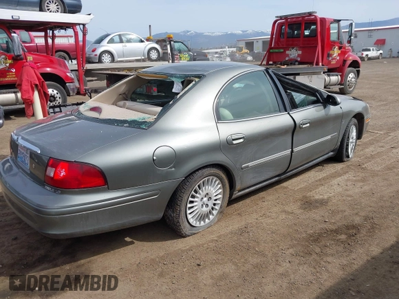 2001 Mercury Sable LS Premium with VIN 1MEFM55S71G632734, listed as a IAAI auction lot 42011855 with 211,402 mi miles and . Bid and sale history available at DreamBid. Image 4.