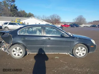 2008 Kia Optima LX with VIN KNAGE123685167925, listed as a IAAI auction lot 41072279 with 168,180 mi miles. Bid and sale history available at carsss.com. Image 13.