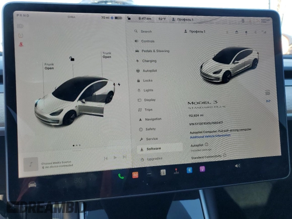 2020 Tesla Model 3 Standard Range Plus with VIN 5YJ3E1EA5LF660417, listed as a Copart auction lot 48144125 with 112,924 mi miles and Salvage Title. Bid and sale history available at DreamBid. Image 9.