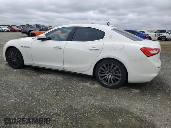 2018 Maserati Ghibli z VIN ZAM57XSA9J1271727, wystawiony jako Copart lot #52155305 z przebiegiem 62 081 mil mil oraz Szkoda całkowita • Salvage title. Historia ofert i sprzedaży dostępna na DreamBid. Obrazek 2.