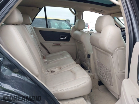 2004 Cadillac SRX with VIN 1GYDE63A540153774, listed as a IAAI auction lot 41500070 with 144,718 mi miles. Bid and sale history available at carsss.com. Image 8.
