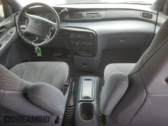 1998 Ford Windstar LX with VIN 2FMZA5146WBC36500, listed as a Copart auction lot 57662025 with 143,017 mi miles and Salvage title. Bid and sale history available at DreamBid. Image 8.