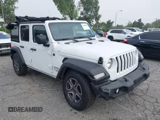 2021 Jeep Wrangler Unlimited Sport Altitude with VIN 1C4HJXDN5MW644613, listed as a IAAI auction lot 42466188 with 63,959 mi miles and . Bid and sale history available at DreamBid. Image 1.