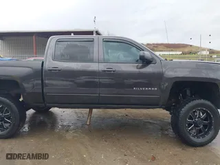 2015 Chevrolet Silverado 1500 LT with VIN 3GCUKRECXFG104194, listed as a IAAI auction lot 41029090 with 149,530 mi miles. Bid and sale history available at carsss.com. Image 14.