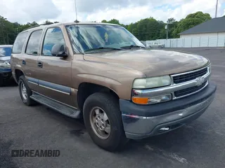 2003 Chevrolet Tahoe LT z VIN 1GNEC13Z43R161990, wystawiony jako IAAI lot #42242612 z przebiegiem 236 997 mil mil oraz . Historia ofert i sprzedaży dostępna na DreamBid. Obrazek 1.