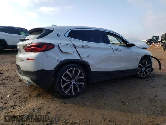 2022 BMW X2 sDrive28i with VIN WBXYH9C05N5T67775, listed as a Copart auction lot 44045505 with 34,100 mi miles and Salvage Title. Bid and sale history available at carsss.com. Image 3.