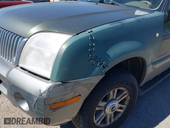 2002 Mercury Mountaineer z VIN 4M2ZU86E22UJ03164, wystawiony jako IAAI lot #42401137 z przebiegiem Nie podano mil oraz . Historia ofert i sprzedaży dostępna na DreamBid. Obrazek 6.