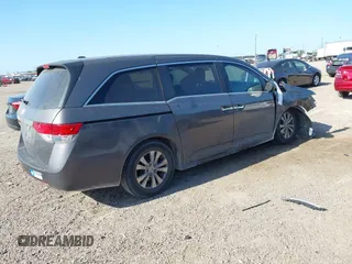 2015 Honda Odyssey EX-L z VIN 5FNRL5H64FB081051, wystawiony jako IAAI lot #42006508 z przebiegiem 154 923 mil mil oraz . Historia ofert i sprzedaży dostępna na DreamBid. Obrazek 4.