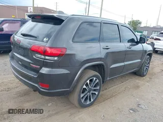 2021 Jeep Grand Cherokee 80th Anniversary with VIN 1C4RJFBG8MC728364, listed as a IAAI auction lot 39803814 with 34,000 mi miles and . Bid and sale history available at DreamBid. Image 4.