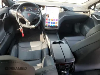 2019 Tesla Model S 100D с VIN 5YJSA1E42KF312803, выставлен на аукционе Copart как лот 71246484 с пробегом 89 820 миль миль и На запчасти • Non repairable. История ставок и продаж доступна на DreamBid. Изображение 8.
