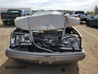 1995 Mercedes-Benz E Class with VIN WDBEA66EXSC176515, listed as a Copart auction lot 71495944 with 141,036 mi miles and Salvage Title. Bid and sale history available at carsss.com. Image 5.