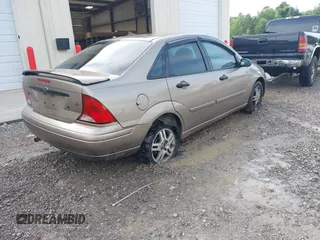 2004 Ford Focus SE with VIN 1FAFP343X4W156745, listed as a IAAI auction lot 42501461 with 289,925 mi miles and . Bid and sale history available at DreamBid. Image 4.