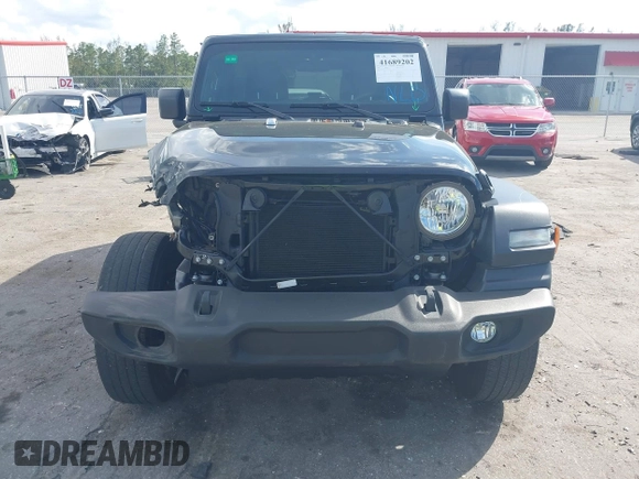 2023 Jeep Wrangler Willys with VIN 1C4HJXDN1PW634763, listed as a IAAI auction lot 41689202 with 23,369 mi miles and . Bid and sale history available at DreamBid. Image 12.