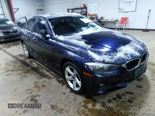 2014 BMW 3 Series 328i xDrive with VIN WBA3B3C57EF545372, listed as a IAAI auction lot 42078980 with 116,627 mi miles. Bid and sale history available at carsss.com. Image 1.