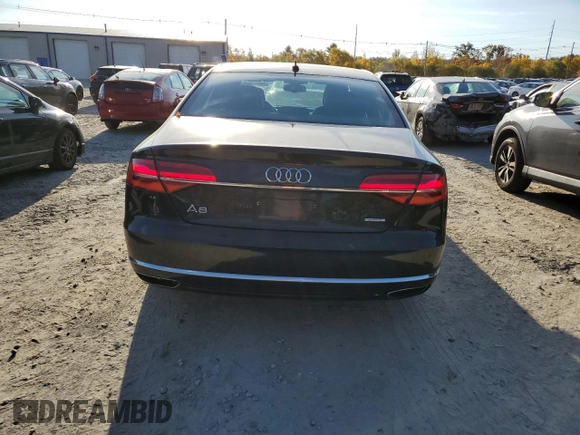 2015 Audi A8 z VIN WAUJGAFD7FN032176, wystawiony jako Copart lot #76943904 z przebiegiem 126 423 mil mil oraz Czysty tytuł • Clean title. Historia ofert i sprzedaży dostępna na DreamBid. Obrazek 6.