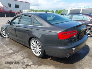 2013 Audi A6 Premium Plus with VIN WAUGFAFC2DN080928, listed as a IAAI auction lot 42141031 with 162,045 mi miles and . Bid and sale history available at DreamBid. Image 3.
