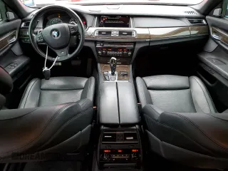 2015 BMW 7 Series 750Li xDrive z VIN WBAYF8C54FD654795, wystawiony jako Copart lot #82381894 z przebiegiem 56 968 mil mil oraz Szkoda całkowita • Salvage title. Historia ofert i sprzedaży dostępna na DreamBid. Obrazek 8.