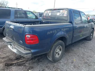 2002 Ford F-150 XLT with VIN 1FTRW07L62KD79180, listed as a IAAI auction lot 42007511 with 359,139 mi miles. Bid and sale history available at carsss.com. Image 4.