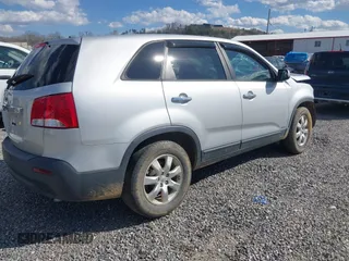 2013 Kia Sorento LX with VIN 5XYKTDA65DG405832, listed as a IAAI auction lot 41811700 with 154,167 mi miles and . Bid and sale history available at DreamBid. Image 4.