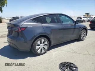 2024 Tesla Model Y Long Range с VIN 7SAYGDEE1RF060140, выставлен на аукционе Copart как лот 60923445 с пробегом 12 765 миль миль и Списание • Salvage title. История ставок и продаж доступна на DreamBid. Изображение 3.