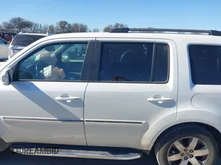 2012 Honda Pilot Touring with VIN 5FNYF3H91CB020673, listed as a IAAI auction lot 41721836 with 123,607 mi miles and . Bid and sale history available at carsss.com. Image 14.