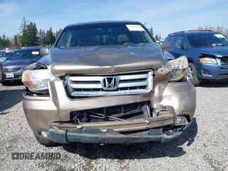 2006 Honda Pilot EX-L with VIN 2HKYF18566H561371, listed as a IAAI auction lot 41950296 with 145,579 mi miles and . Bid and sale history available at DreamBid. Image 12.