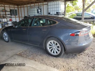 2017 Tesla Model S 100D with VIN 5YJSA1E20HF198419, listed as a Copart auction lot 61481605 with 52,853 mi miles and Salvage title. Bid and sale history available at DreamBid. Image 2.