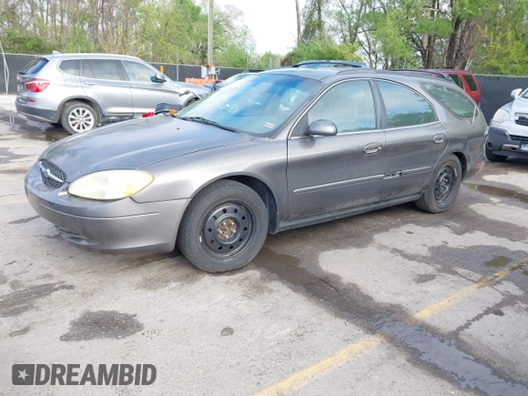 2003 Ford Taurus SE Standard with VIN 1FAFP58U63G117125, listed as a IAAI auction lot 42061812 with 172,154 mi miles. Bid and sale history available at carsss.com. Image 2.