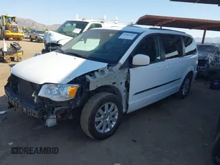 2014 Chrysler Town & Country Touring with VIN 2C4RC1BG8ER434940, listed as a IAAI auction lot 42483562 with 162,625 mi miles and . Bid and sale history available at DreamBid. Image 2.