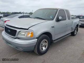 2003 Ford F-150 XL with VIN 1FTRX07253KB95404, listed as a IAAI auction lot 41945734 with 1 mi miles. Bid and sale history available at carsss.com. Image 2.