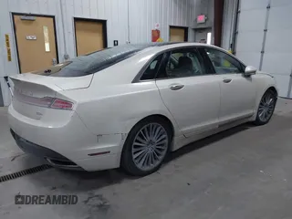 2015 Lincoln MKZ Hybrid with VIN 3LN6L2LU1FR604978, listed as a IAAI auction lot 41594407 with 165,148 mi miles and . Bid and sale history available at DreamBid. Image 4.